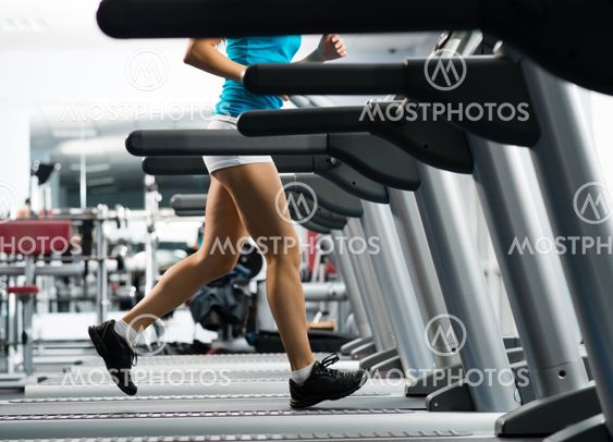 woman running on a treadmill