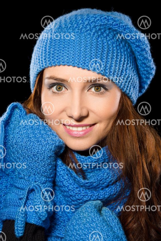 Young happy woman wearing winter cloth