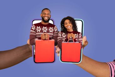 Couple celebrating holiday joy together through...