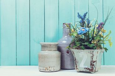 Shabby chic style home decorations on wooden background