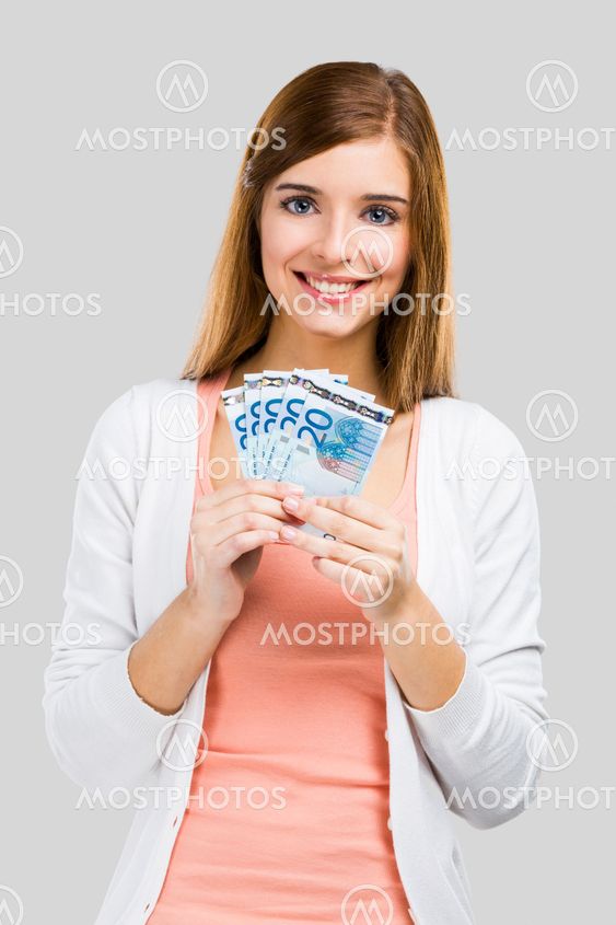 Beautiful woman holding money