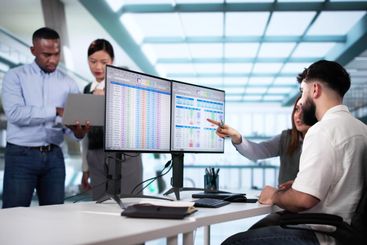 People Working With Spreadsheet Data