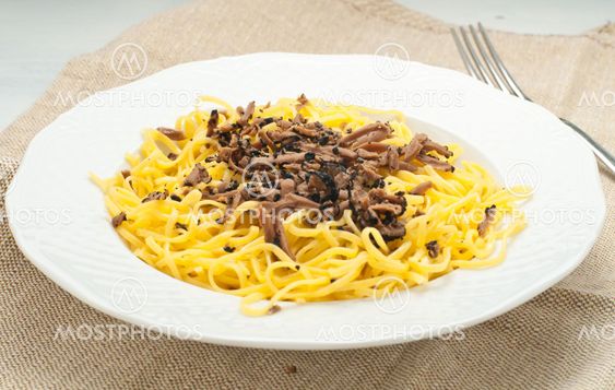 Pasta typical of Piedmont called tajarin with truffle