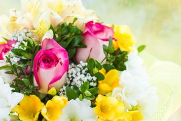 Beautiful floral arrangement featuring pink roses and...