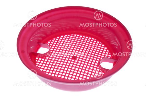 Pink plastic sand sieve