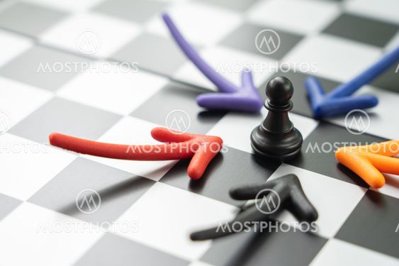 chessboard with a chess piece on the back Negotiating in...