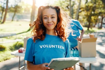 Outdoor, woman and portrait of volunteer with tablet for...