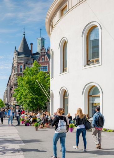 Pedestrians on city street in Helsinki, Finland
