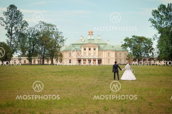 groom and the bride at the palace