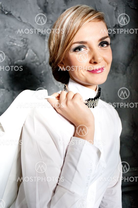 the young business lady in a white jacket