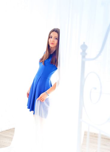 Beautiful young woman with long brunette hair