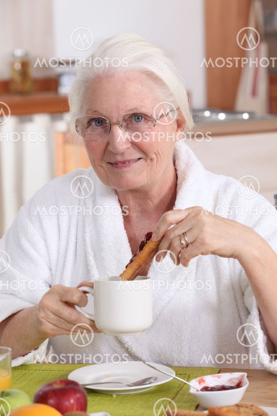 grandmother having breakfast