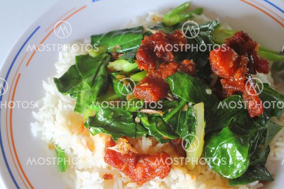 stir fried kale with crispy pork