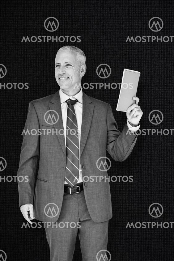 Composite image of businessman smiling