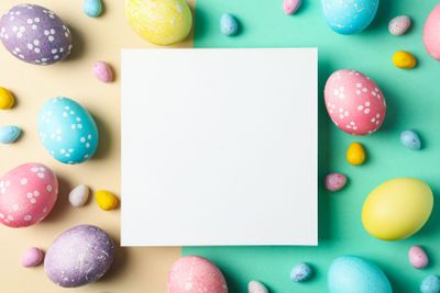 Easter eggs on two tone background, space for text