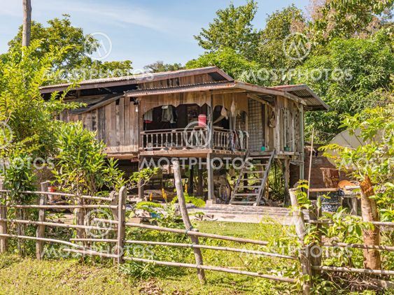 Typical house in the rural Laos at the bank of Mekong...