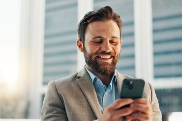 Business, cellphone and man in city, scroll and...