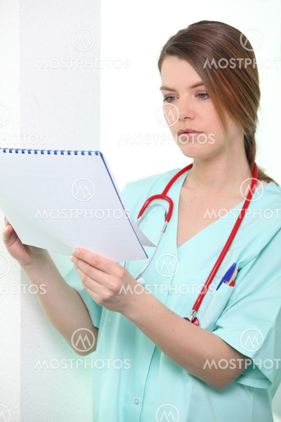 Nurse looking at calendar