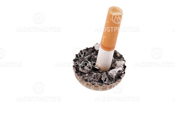 Cigarette butt and ash in a bottle cap