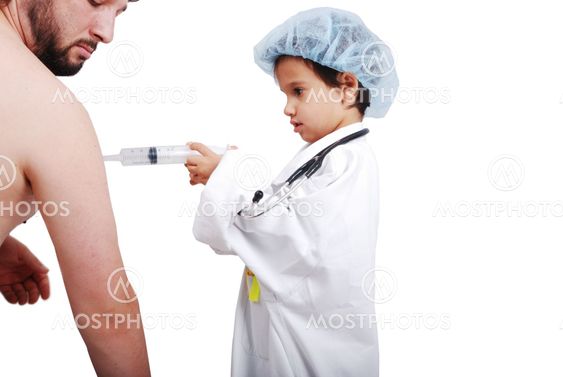 Boy in uniform giving injection to adult patient
