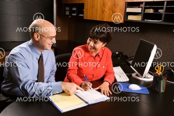 Businessman and businesswoman.