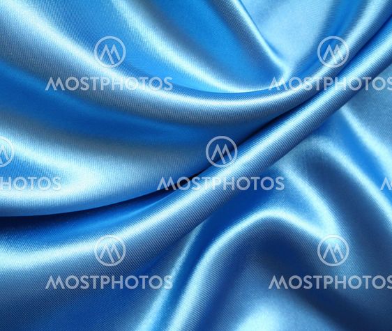 Smooth elegant blue silk as background