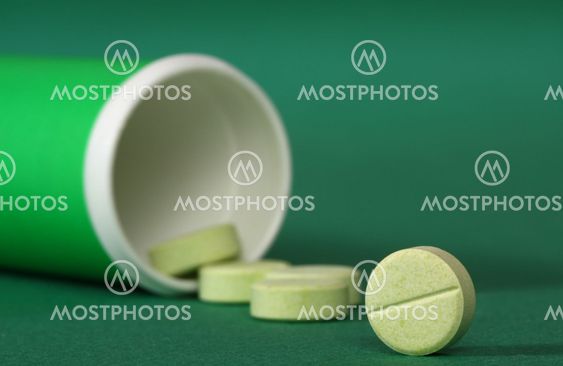 Medicin piller lække fra en flaske