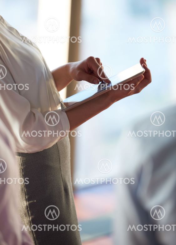business woman working on tablet computer