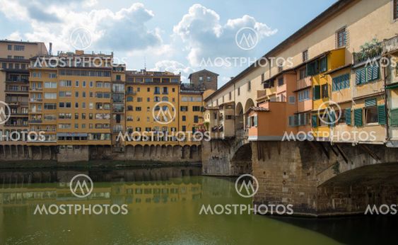 Ponte Vecchio landmark reflected on arno river....