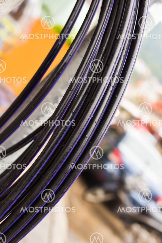 Messy electrical cables in thailand - Uncovered optical fiber technology open air outdoors asian cities