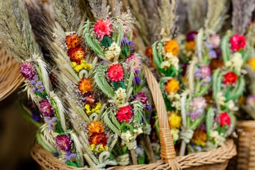 Traditional Lithuanian Easter palms known as verbos sold...