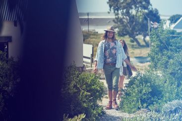 Walking, outdoor and couple with vacation, love and...