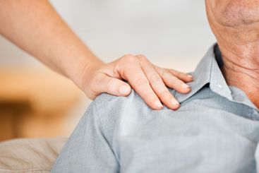 Closeup, hand and support with senior person for care or...