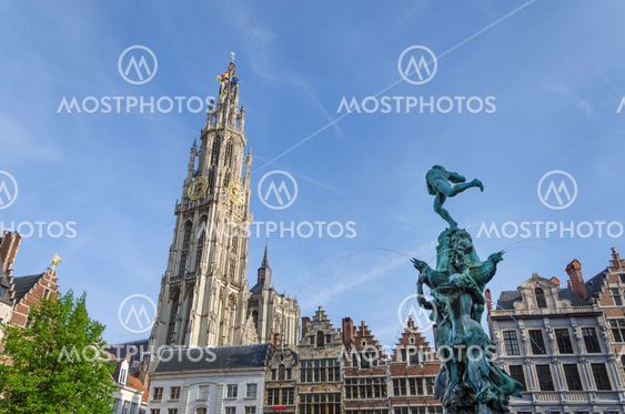 Statue of Brabo and the Cathedral of our Lady at Grand Place in Antwerp, Belgium.