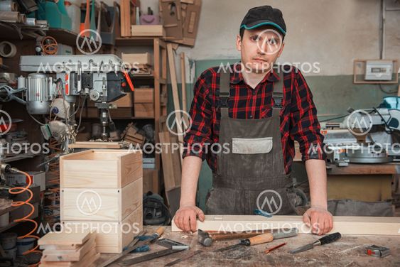 Carpenter working with a chisel