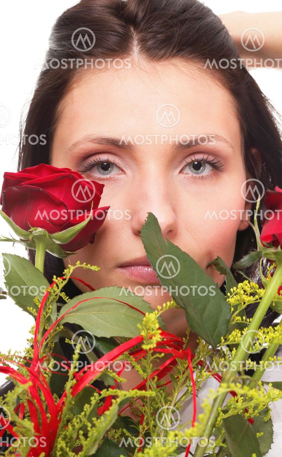 Closeup portrait of attractive young woman holding a red...