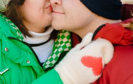 Winter plus size couple lovestory. Happy smiling man,...