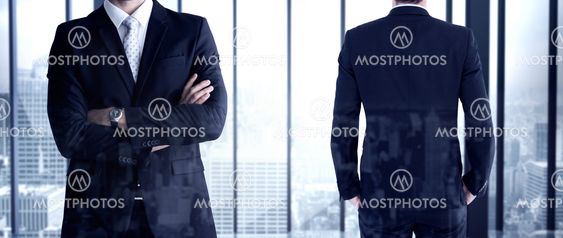 Composite image of rear view of handsome businessman
