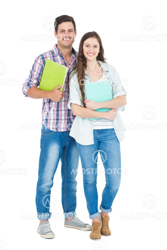 Portrait of students couple holding books