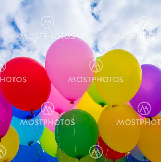 A colorful flying balloon in blue sky
