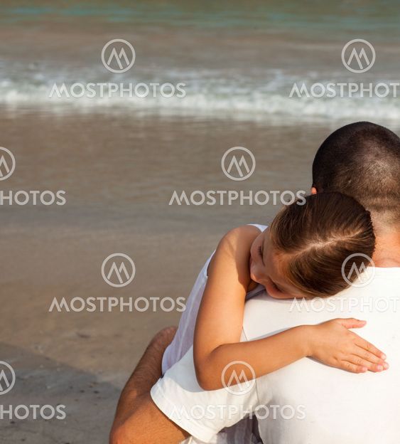 Portrait of a relaxed Daughter Hugging his father