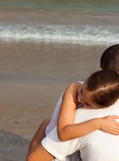 Portrait of a relaxed Daughter Hugging his father