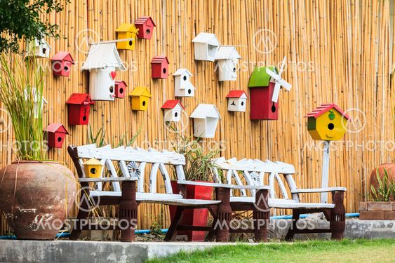 Vintage Bench and Wood wall with Bird's nest