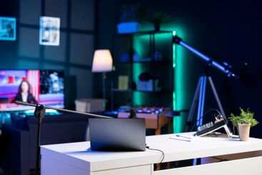 Empty home studio interior illuminated with neon lights...