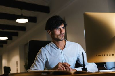 Portrait of a confident concentrated businessman working