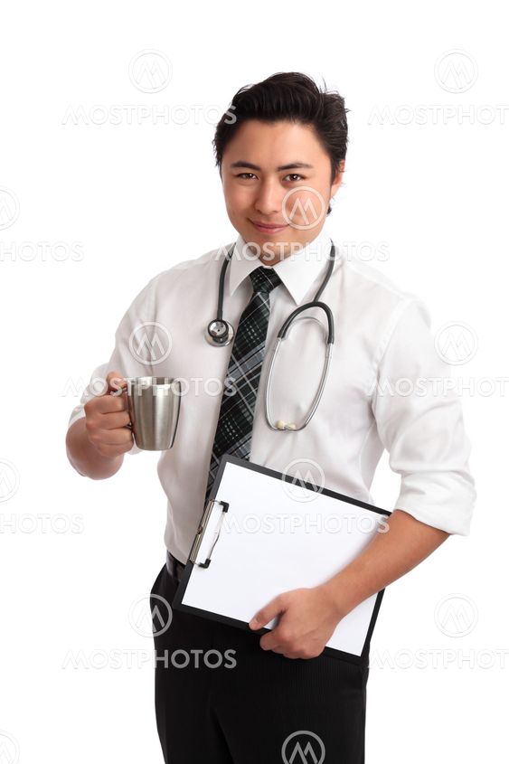 Young doctor with coffee cup