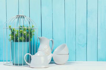 Shabby chic style home decorations on wooden background