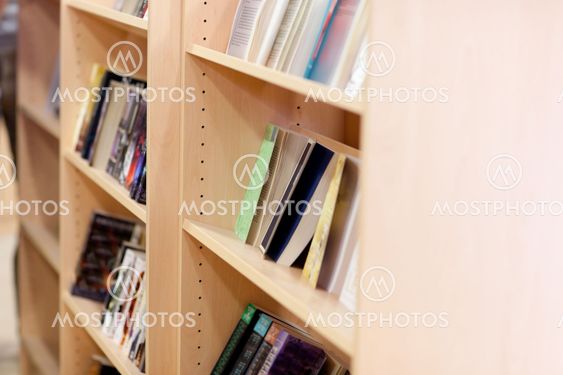 close-up of a bookshelves in a library at the university