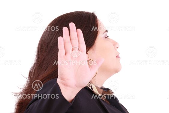 Serious business woman making stop sign over white, focus on woman