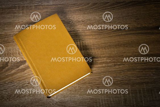 Yellow book on the table